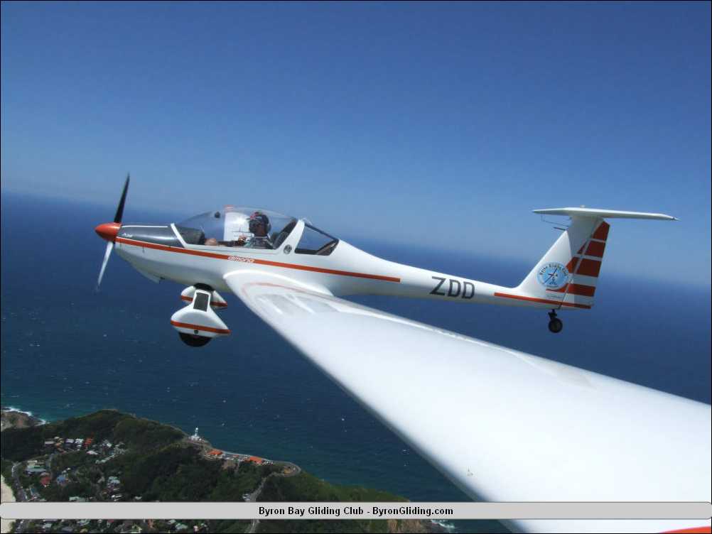 Dimona Motor Glider over Cape Byron Lighthouse.jpg