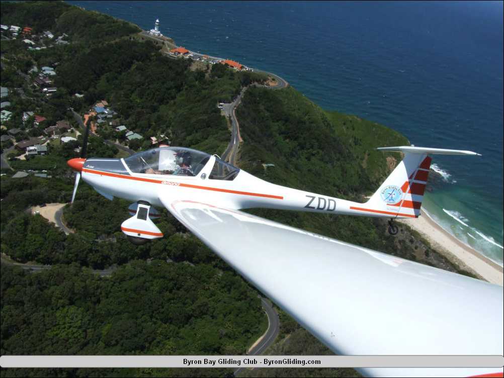 Dimona Motor Glider over Lighthouse Byron Bay.jpg