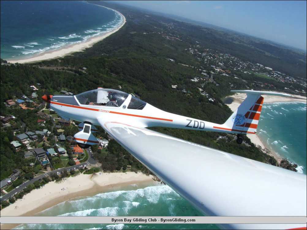 Dimona Motor Glider over Watego Beach.jpg